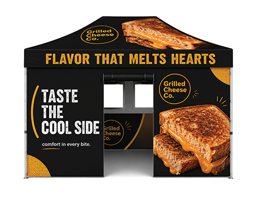 Custom printed 10x15 event tent for restaurants and catering businesses showcasing food branding at an outdoor venue.