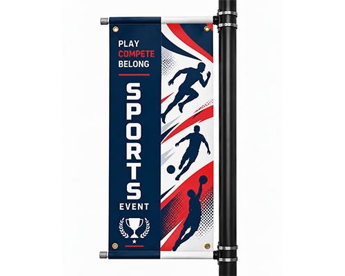 Custom pole banners with vibrant printed graphics mounted along a university campus walkway