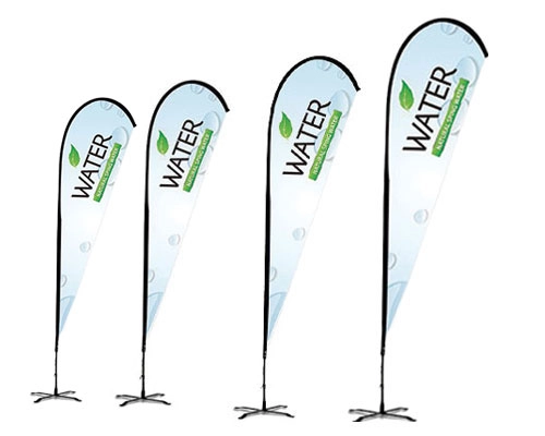 Teardrop flag waving in the wind outside a business for promotions